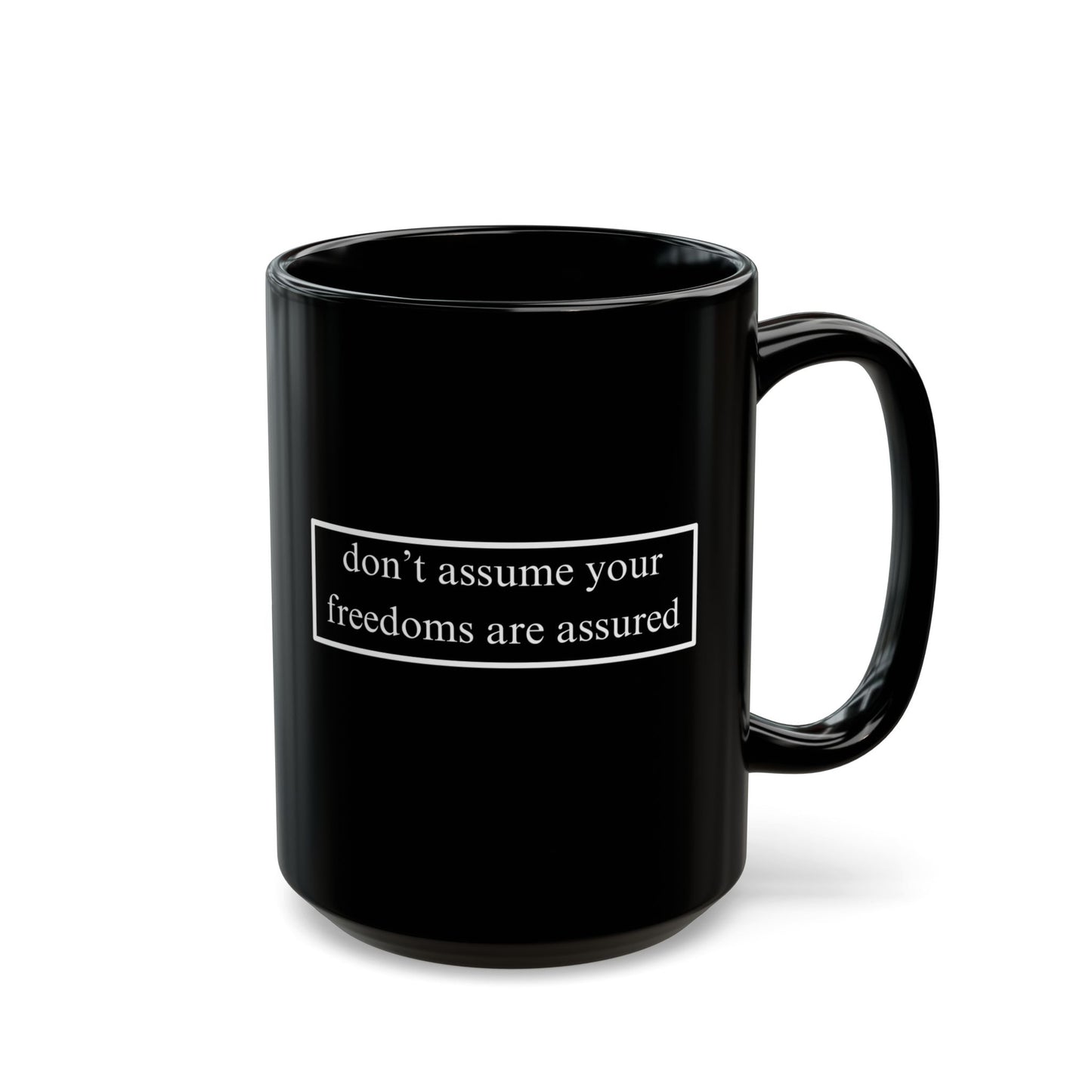 don't assume your freedoms are assured White font Black Mug by theGreenDragonTavern.shop