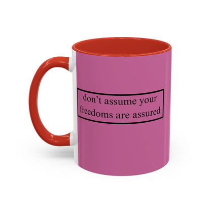 don't assume your freedoms are assured Black font Pink Accent Mug by theGreenDragonTavern.shop