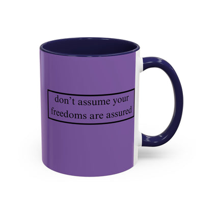 don't assume your freedoms are assured Black font Light Purple Accent Mug by theGreenDragonTavern.shop