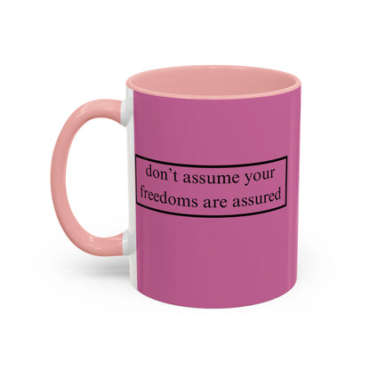 don't assume your freedoms are assured Black font Pink Accent Mug by theGreenDragonTavern.shop