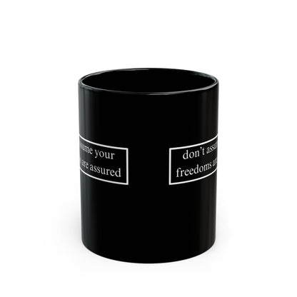 don't assume your freedoms are assured White font Black Mug by theGreenDragonTavern.shop