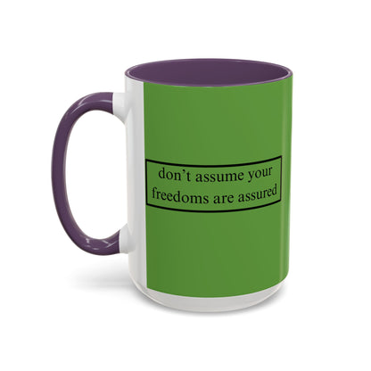 don't assume your freedoms are assured Black font Green Accent Mug by theGreenDragonTavern.shop