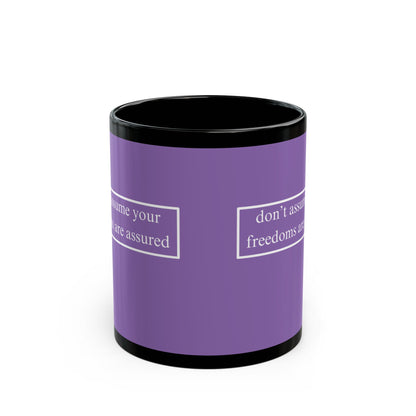 don't assume your freedoms are assured White font Light Purple Mug by theGreenDragonTavern.shop