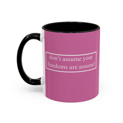 don't assume your freedoms are assured White font Pink Accent Mug by theGreenDragonTavern.shop