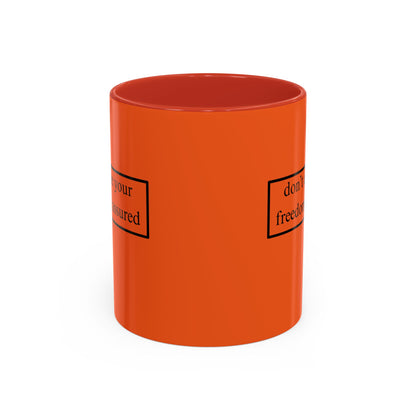 don't assume your freedoms are assured Black font Orange Accent Mug by theGreenDragonTavern.shop