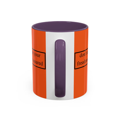 don't assume your freedoms are assured Black font Orange Accent Mug by theGreenDragonTavern.shop