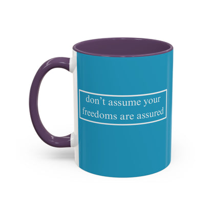 don't assume your freedoms are assured White font Turquoise Accent Mug by theGreenDragonTavern.shop