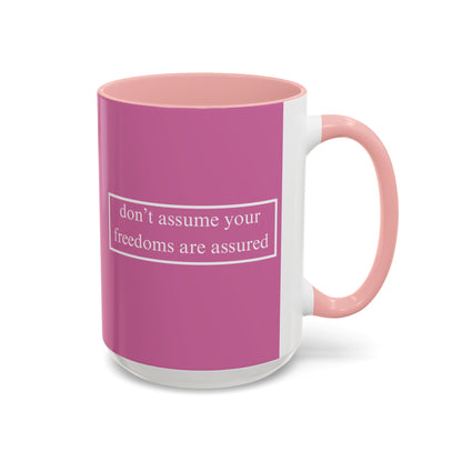 don't assume your freedoms are assured White font Pink Accent Mug by theGreenDragonTavern.shop