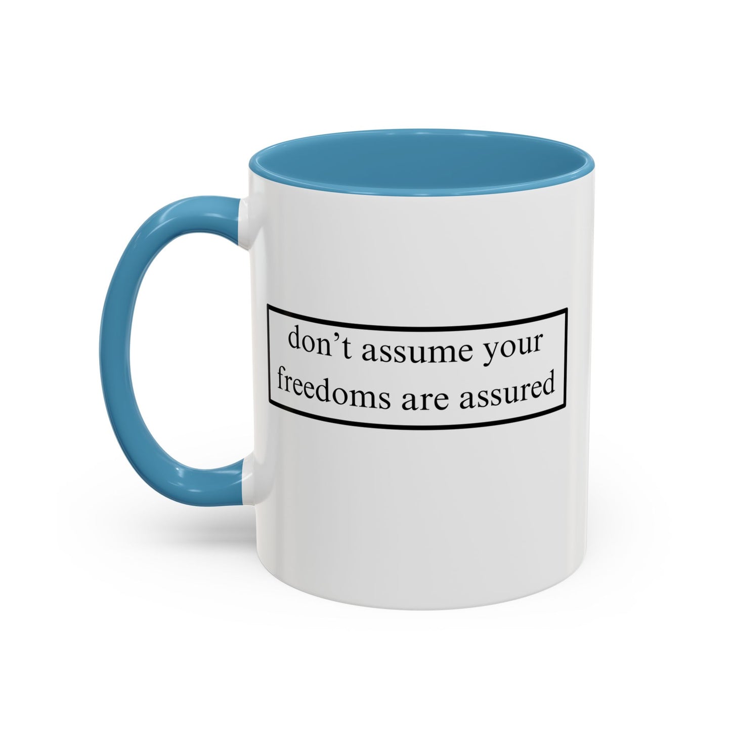 don't assume your freedoms are assured Black font White Accent Mug by theGreenDragonTavern.shop