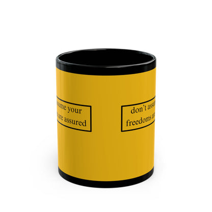 don't assume your freedoms are assured Black font Yellow Mug by theGreenDragonTavern.shop