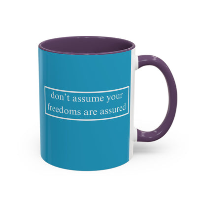 don't assume your freedoms are assured White font Turquoise Accent Mug by theGreenDragonTavern.shop