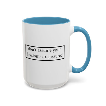 don't assume your freedoms are assured Black font White Accent Mug by theGreenDragonTavern.shop