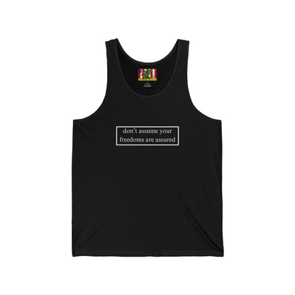 don't assume your freedoms are assured White font Unisex Jersey Tank Top by theGreenDragonTavern.shop