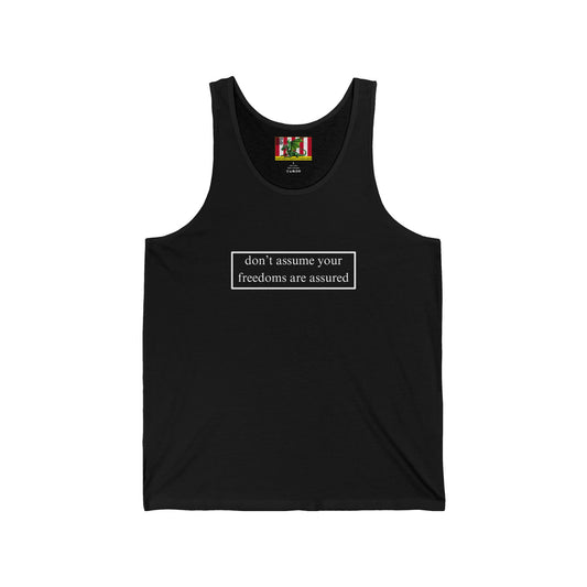don't assume your freedoms are assured White font Unisex Jersey Tank Top by theGreenDragonTavern.shop