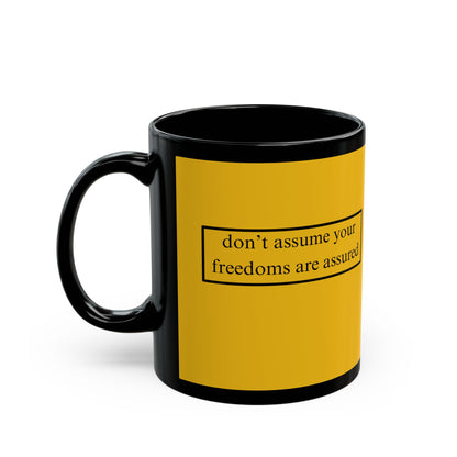 don't assume your freedoms are assured Black font Yellow Mug by theGreenDragonTavern.shop