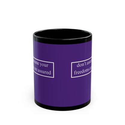 don't assume your freedoms are assured White font Dark Purple Mug by theGreenDragonTavern.shop