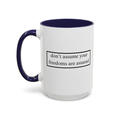 don't assume your freedoms are assured Black font White Accent Mug by theGreenDragonTavern.shop