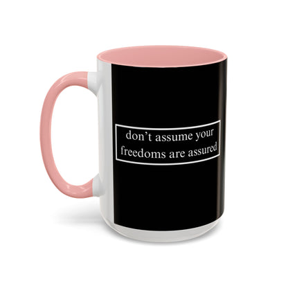 don't assume your freedoms are assured White font Black Accent Mug by theGreenDragonTavern.shop