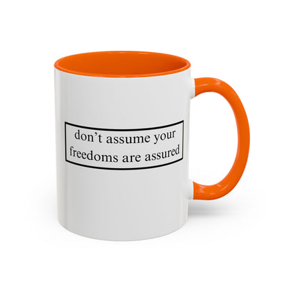 don't assume your freedoms are assured Black font White Accent Mug by theGreenDragonTavern.shop