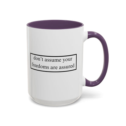 don't assume your freedoms are assured Black font White Accent Mug by theGreenDragonTavern.shop
