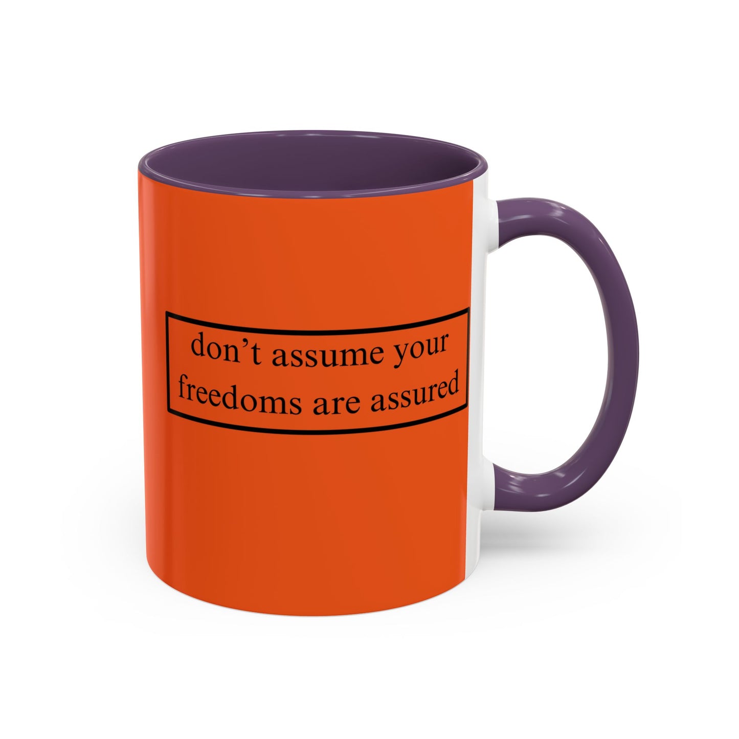 don't assume your freedoms are assured Black font Orange Accent Mug by theGreenDragonTavern.shop