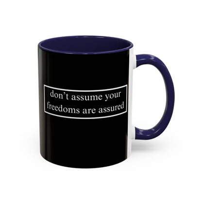don't assume your freedoms are assured White font Black Accent Mug by theGreenDragonTavern.shop