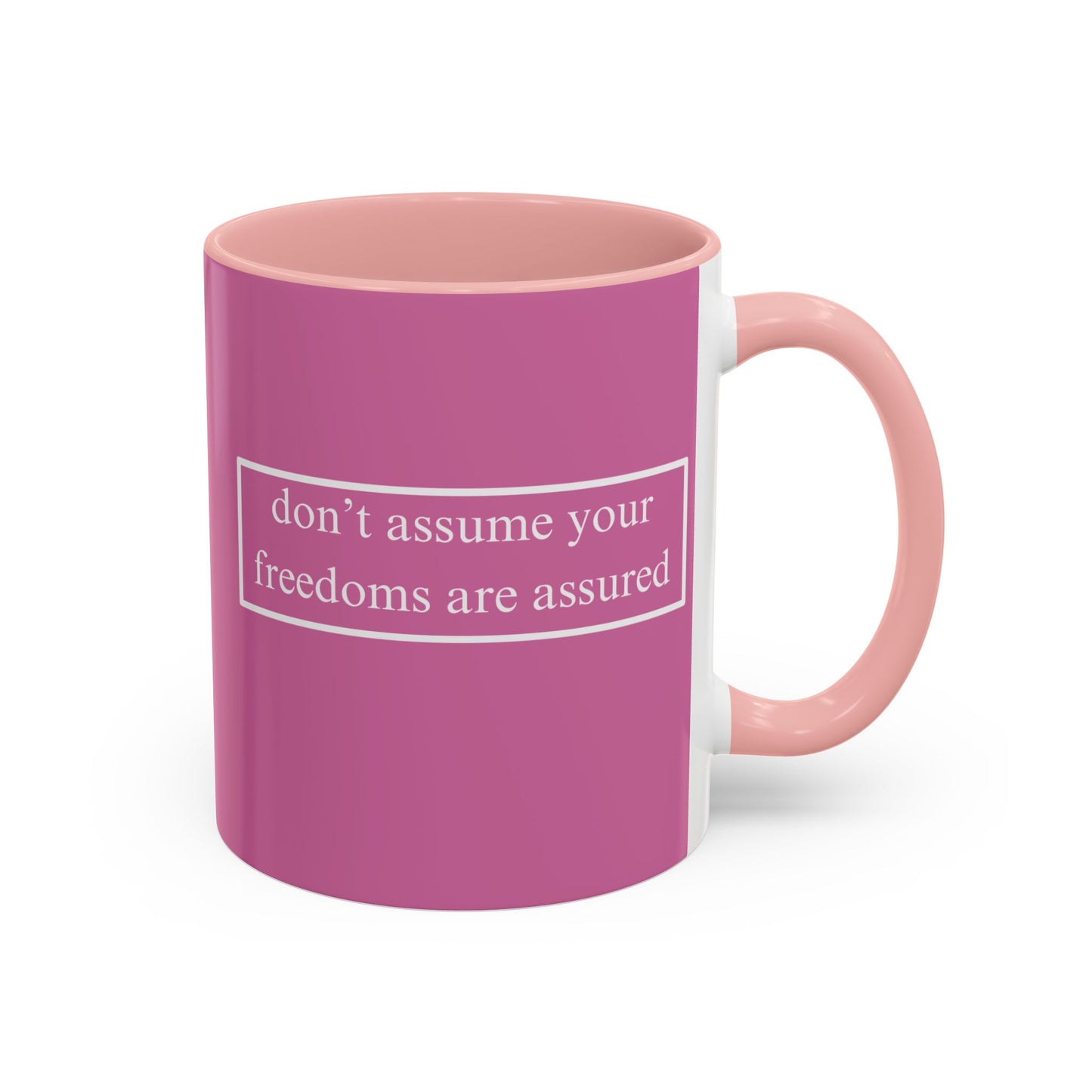 don't assume your freedoms are assured White font Pink Accent Mug by theGreenDragonTavern.shop