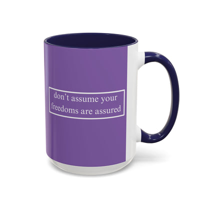 don't assume your freedoms are assured White font Light Purple Accent Mug by theGreenDragonTavern.shop