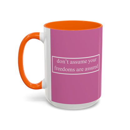 don't assume your freedoms are assured White font Pink Accent Mug by theGreenDragonTavern.shop