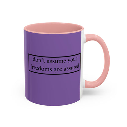 don't assume your freedoms are assured Black font Light Purple Accent Mug by theGreenDragonTavern.shop