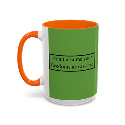 don't assume your freedoms are assured Black font Green Accent Mug by theGreenDragonTavern.shop