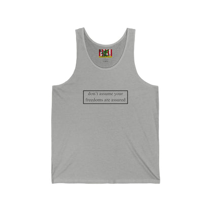 don't assume your freedoms are assured Black font Unisex Jersey Tank Top by theGreenDragonTavern.shop