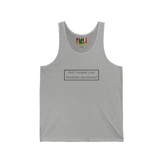 don't assume your freedoms are assured Black font Unisex Jersey Tank Top by theGreenDragonTavern.shop