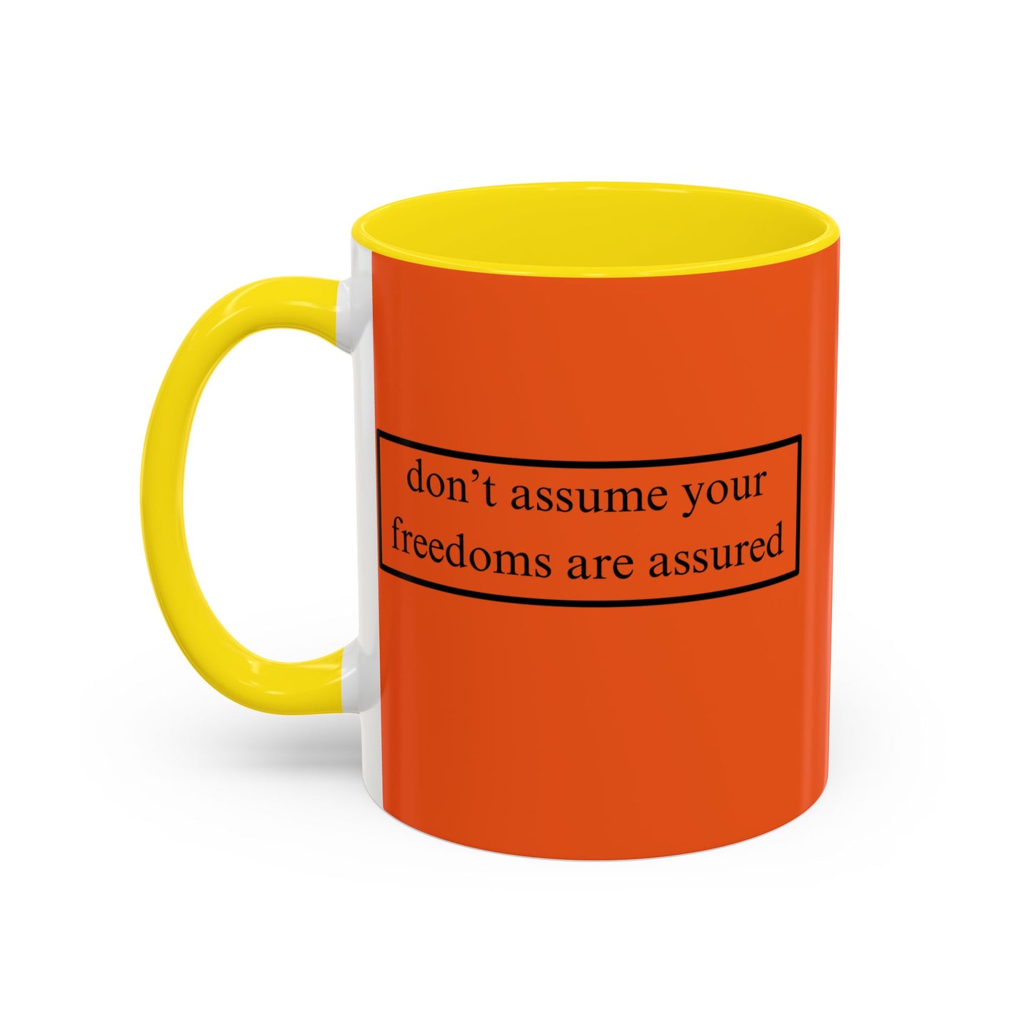 don't assume your freedoms are assured Black font Orange Accent Mug by theGreenDragonTavern.shop