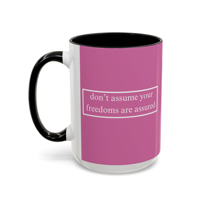 don't assume your freedoms are assured White font Pink Accent Mug by theGreenDragonTavern.shop