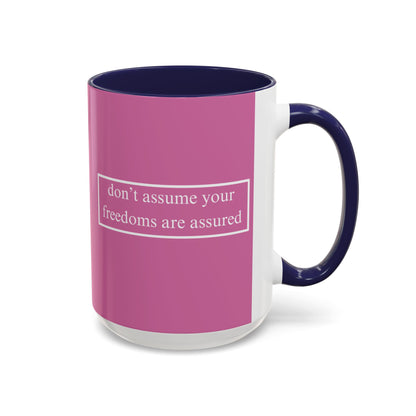 don't assume your freedoms are assured White font Pink Accent Mug by theGreenDragonTavern.shop