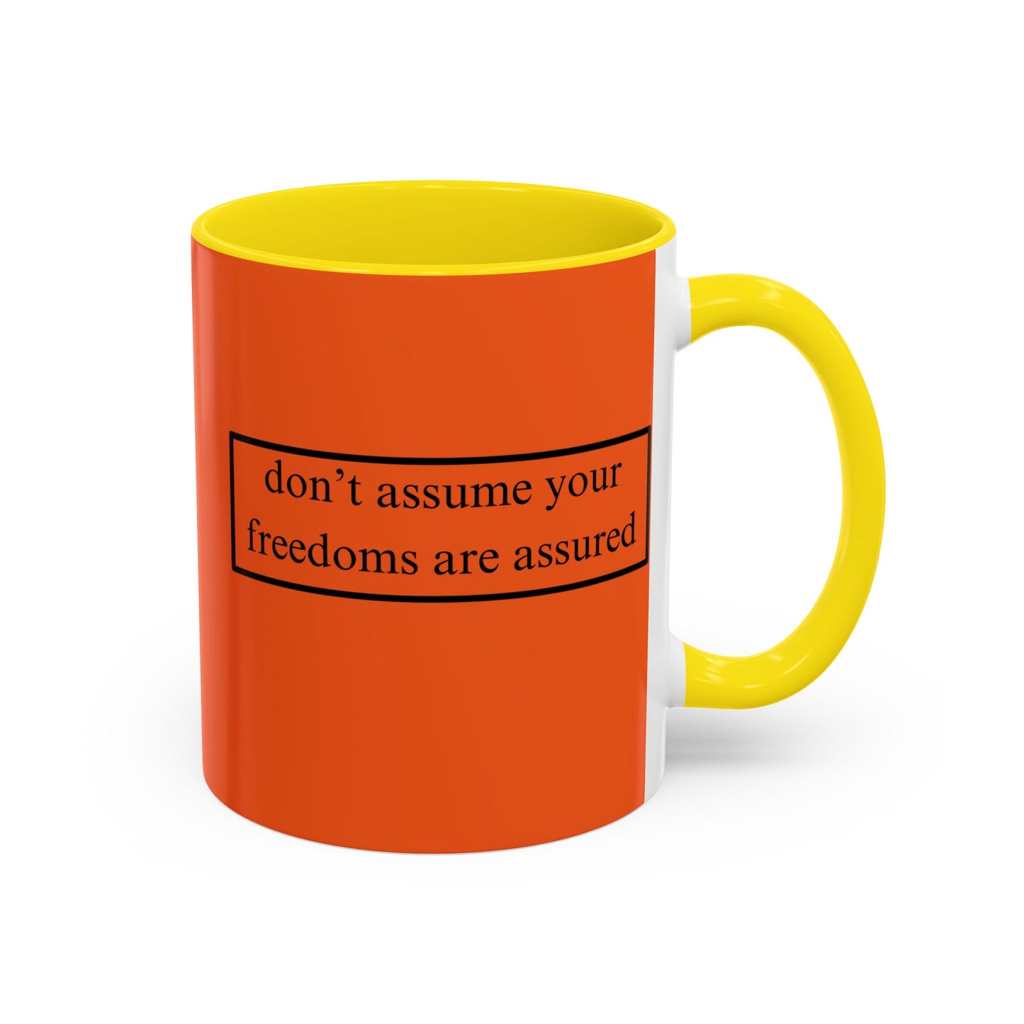 don't assume your freedoms are assured Black font Orange Accent Mug by theGreenDragonTavern.shop