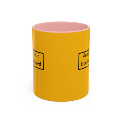 don't assume your freedoms are assured Black font Yellow Accent Mug by theGreenDragonTavern.shop