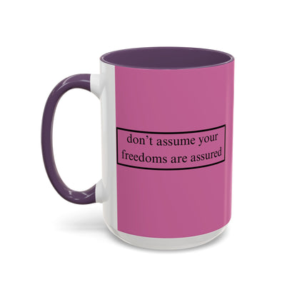 don't assume your freedoms are assured Black font Pink Accent Mug by theGreenDragonTavern.shop