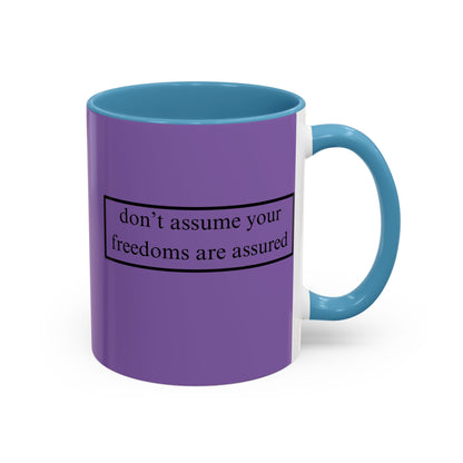 don't assume your freedoms are assured Black font Light Purple Accent Mug by theGreenDragonTavern.shop