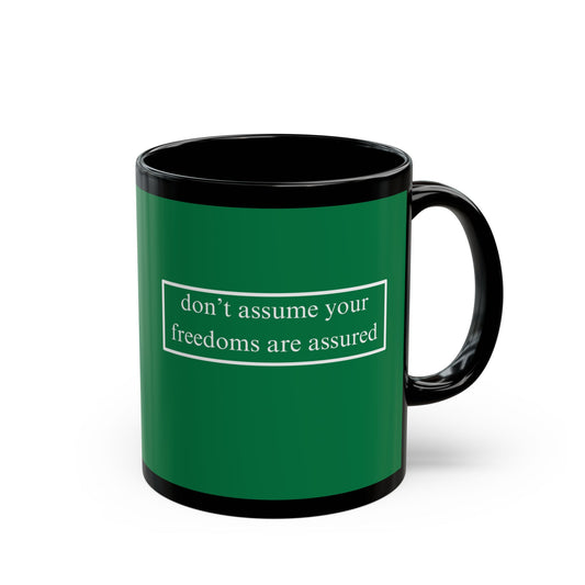 don't assume your freedoms are assured White font Green Mug by theGreenDragonTavern.shop