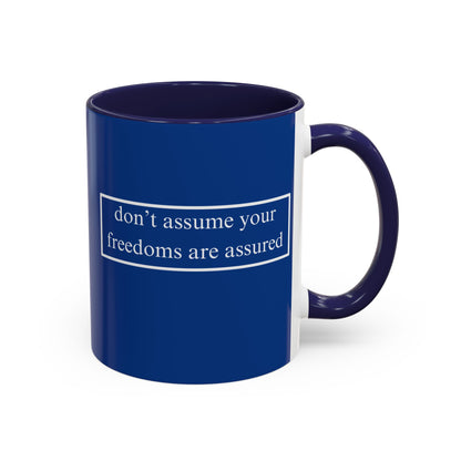 don't assume your freedoms are assured White font Blue Accent Mug by theGreenDragonTavern.shop