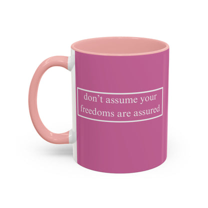 don't assume your freedoms are assured White font Pink Accent Mug by theGreenDragonTavern.shop