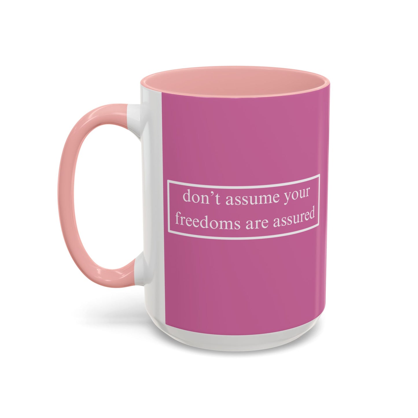 don't assume your freedoms are assured White font Pink Accent Mug by theGreenDragonTavern.shop