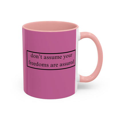 don't assume your freedoms are assured Black font Pink Accent Mug by theGreenDragonTavern.shop