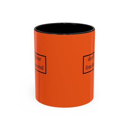 don't assume your freedoms are assured Black font Orange Accent Mug by theGreenDragonTavern.shop
