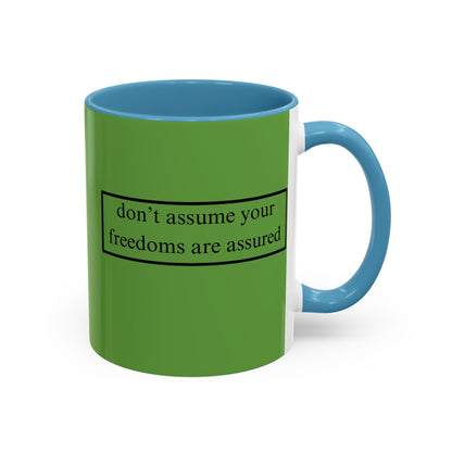 don't assume your freedoms are assured Black font Green Accent Mug by theGreenDragonTavern.shop