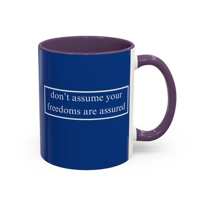 don't assume your freedoms are assured White font Blue Accent Mug by theGreenDragonTavern.shop