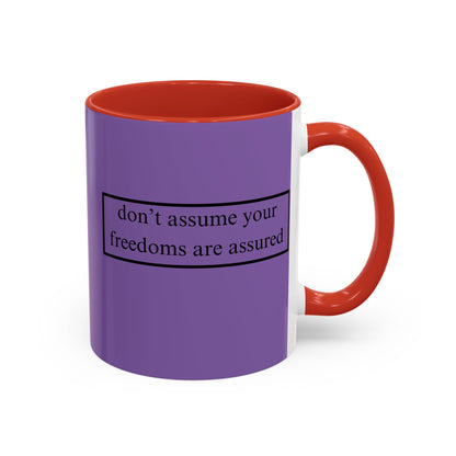 don't assume your freedoms are assured Black font Light Purple Accent Mug by theGreenDragonTavern.shop