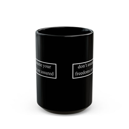 don't assume your freedoms are assured White font Black Mug by theGreenDragonTavern.shop